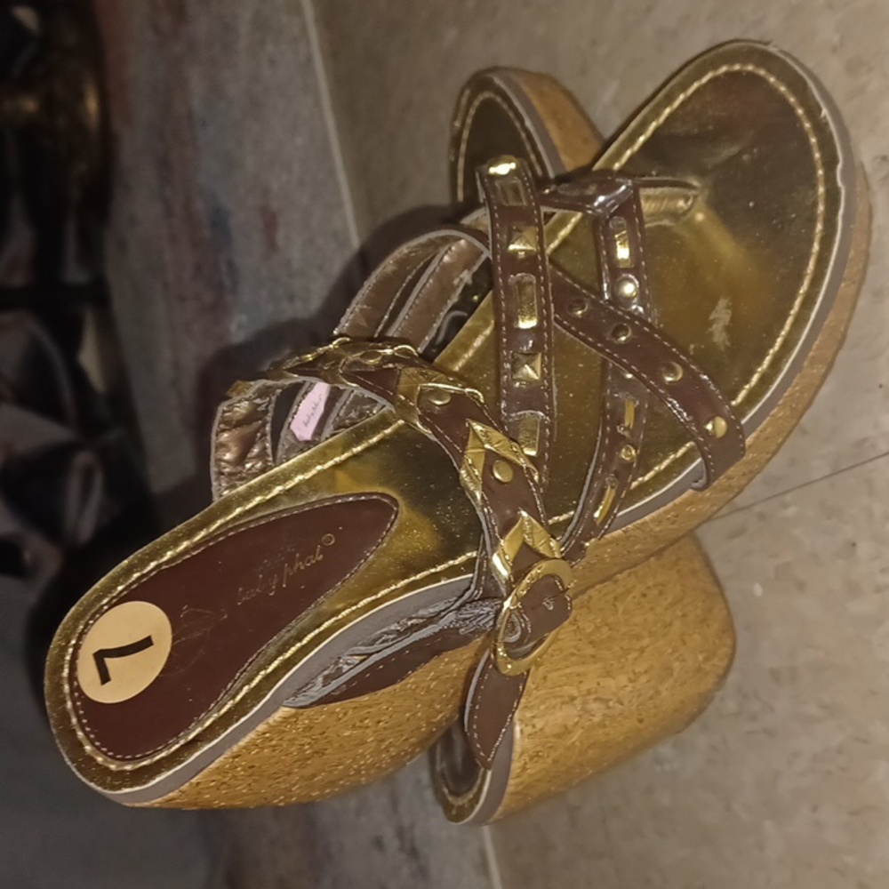Baby Phat wedged strapped thong sandal.